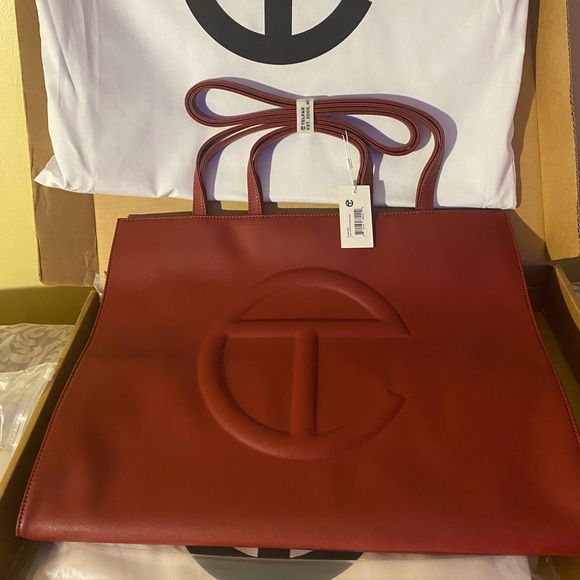 Telfar Handbags - TELFAR 🍁🍁🍁NWT LG OXBLOOD! Sold out!! GUARANTEED Authentic w/receipt! ❤️❤️❤️